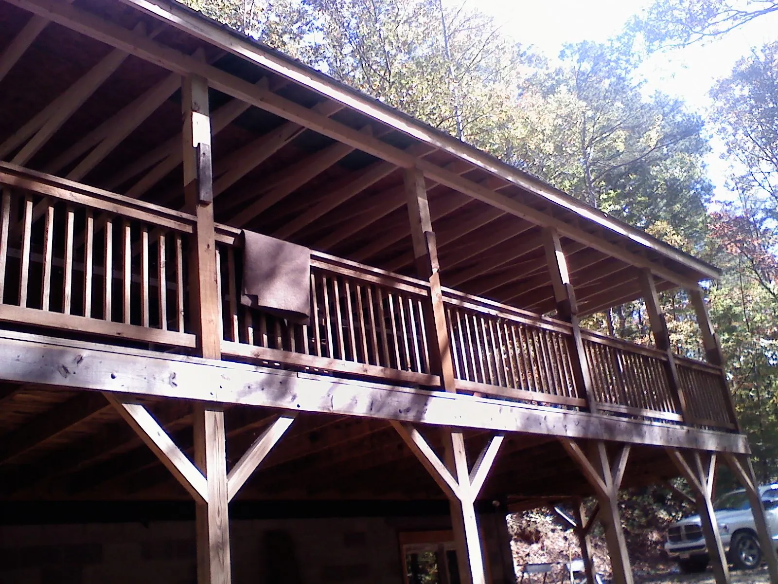 Timber framing under a new elevated porch and deck — Roof Leak Repair in Hewitt by Roofing Brothers